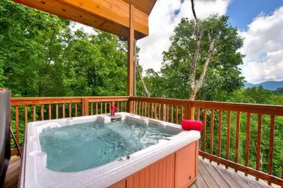 hot tub on majestic escape is one of our best gatlinburg cabins with mountain views