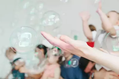 people playing with bubbles